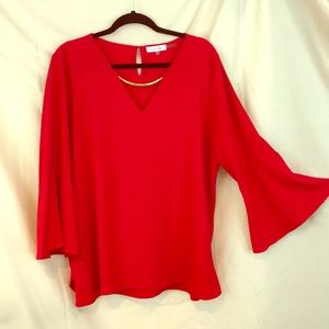 Beautiful Calvin Klein top. Red looks good on you!